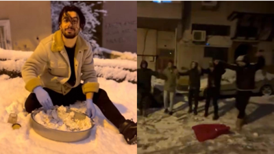 İstanbul'da karda renkli görüntüler; kimi kardan çiğ köfte yaptı kimi köpeğini tepsiyle kaydırdı