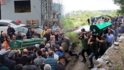 Rusya'da ölen 2 dağcının cenazesi memleketlerinde toprağa verildi