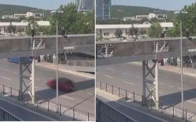 Kartal’da üst geçitten elektrik direğine atladı